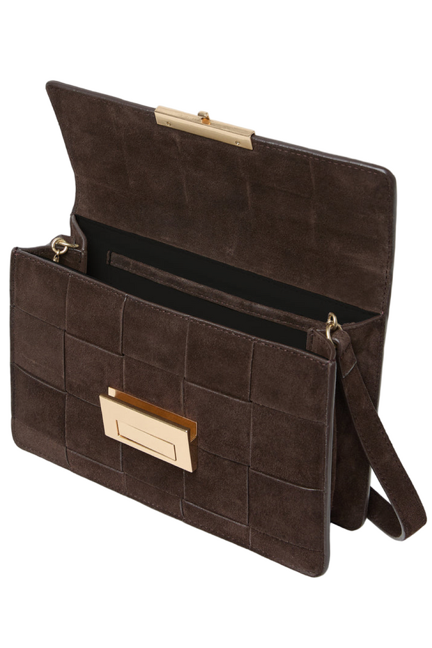 Brown leather clutch bag with gold accents on a white background