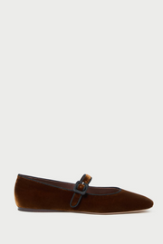 Brown velvet loafer with a decorative buckle on a white background