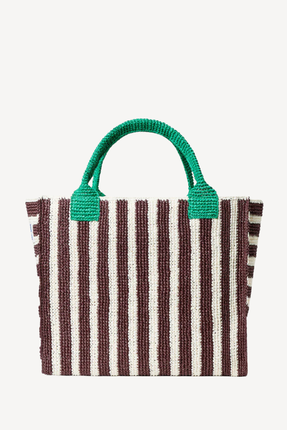 Striped bag with green handles on a light gray background