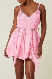 Image of model wearing LOVESHACKFANCY Ashida dress in begonia pink