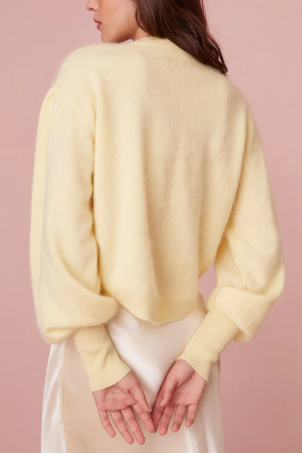 Image of model wearing Loveshackfancy Candela pullover 