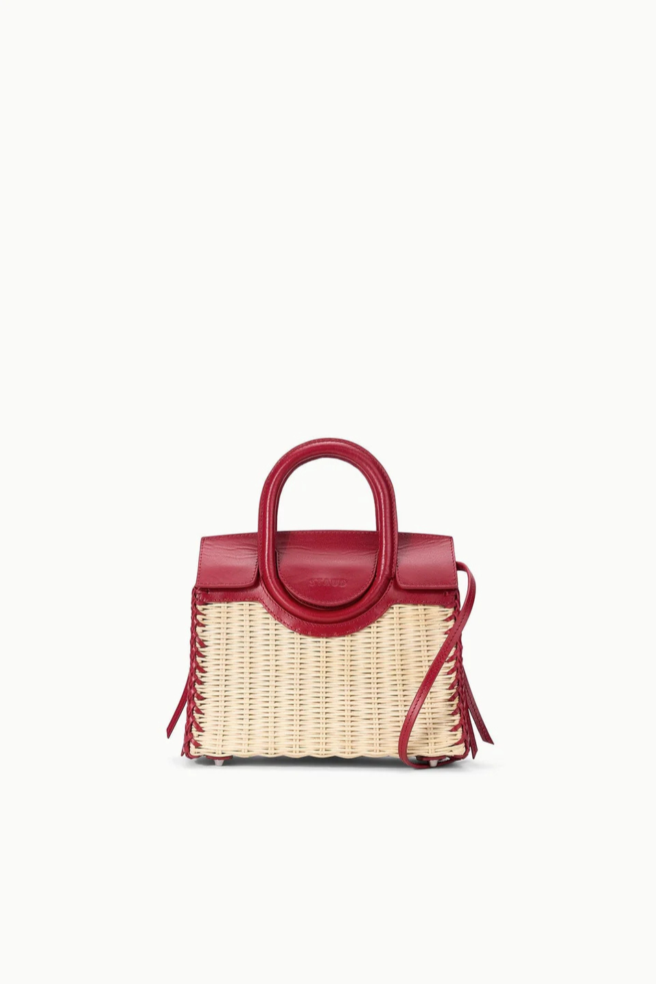Red handbag with a woven design on a white background