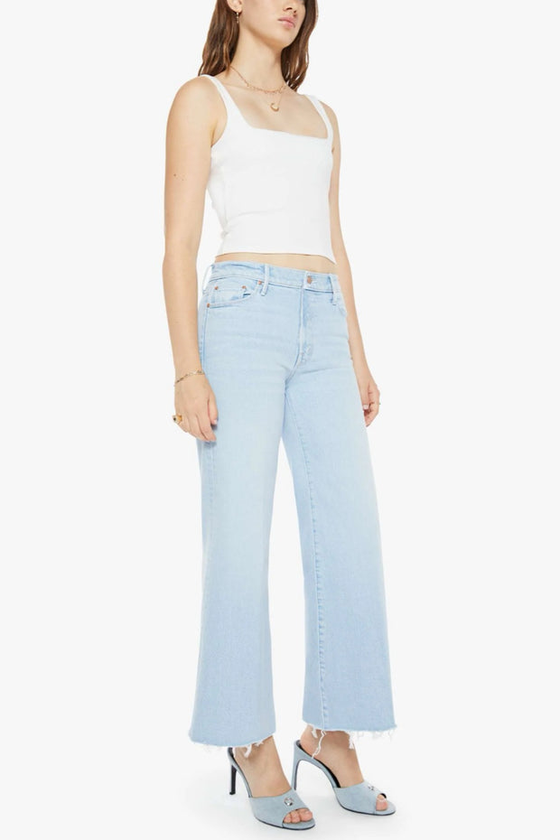 Image of model wearing the Mother The Twister Ankle Fray angled front view