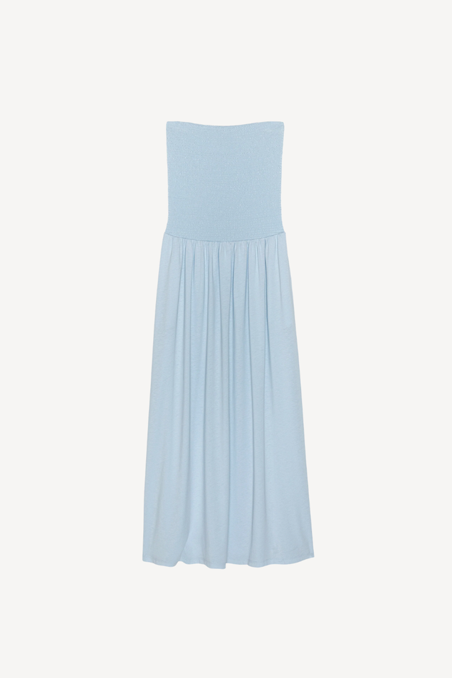 Light blue strapless dress on a white background