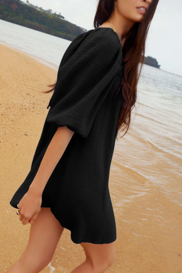 Image of model wearing Nation LTD Carter dress in black