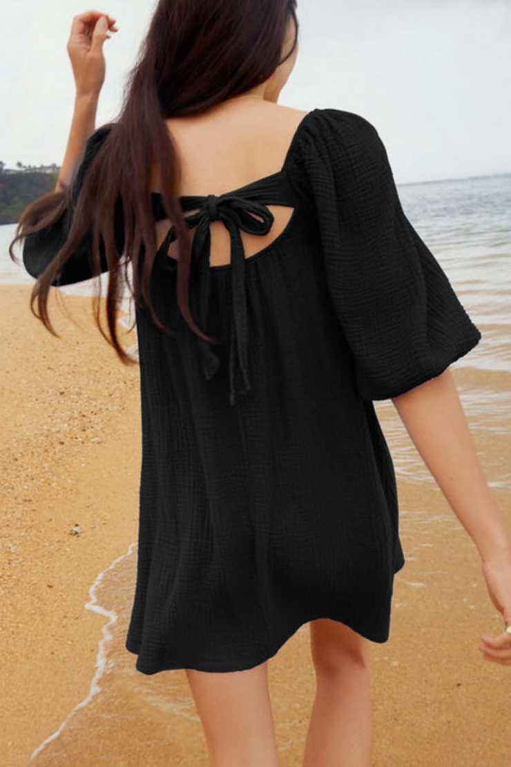 Image of model wearing Nation LTD Carter dress in black