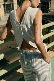 Image of model wearing the Nation Ltd Eliza Sweater back view