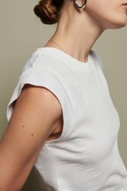 Image of model wearing Nation LTD Patti muscle tank in white