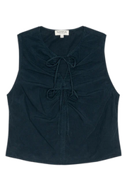 Midnight sleeveless top with a bow detail on a white background
