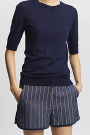 Image of model wearing the Saint Art Jen Pinstripe Board Short front view