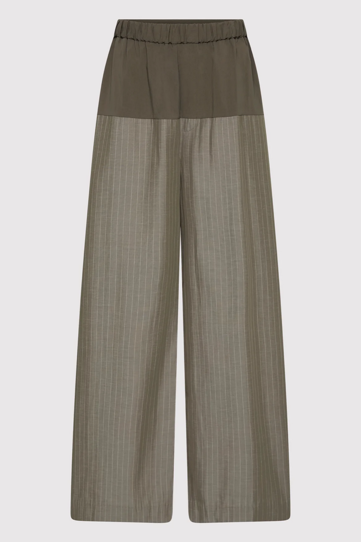 Pair of khaki pinstripe wide-leg pants on a light gray background