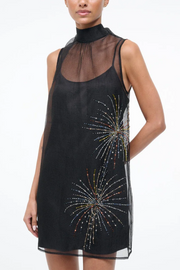 Black dress with bead embellishments on a white background