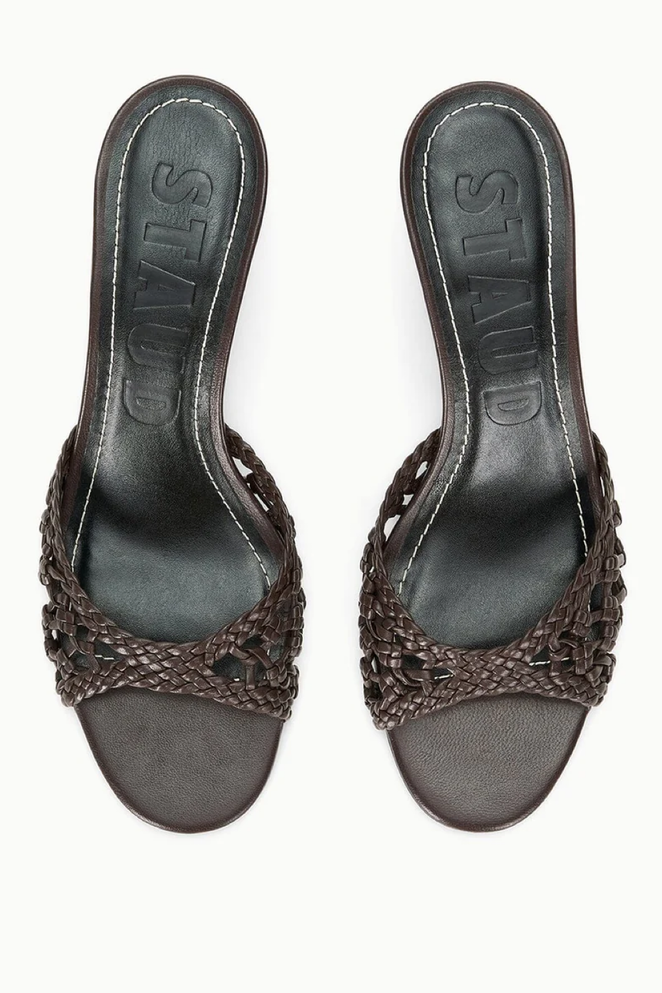 Pair of brown high-heeled sandals with woven design on a white background