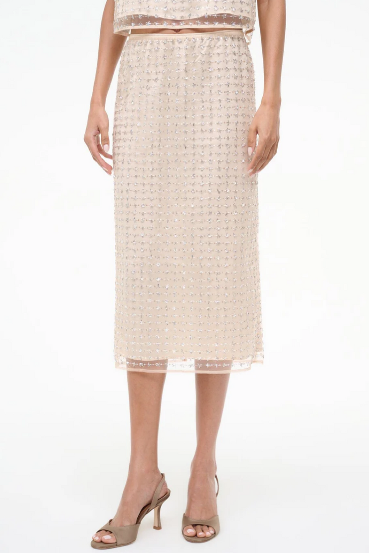 Two tone beaded skirt worn by a person on a white background