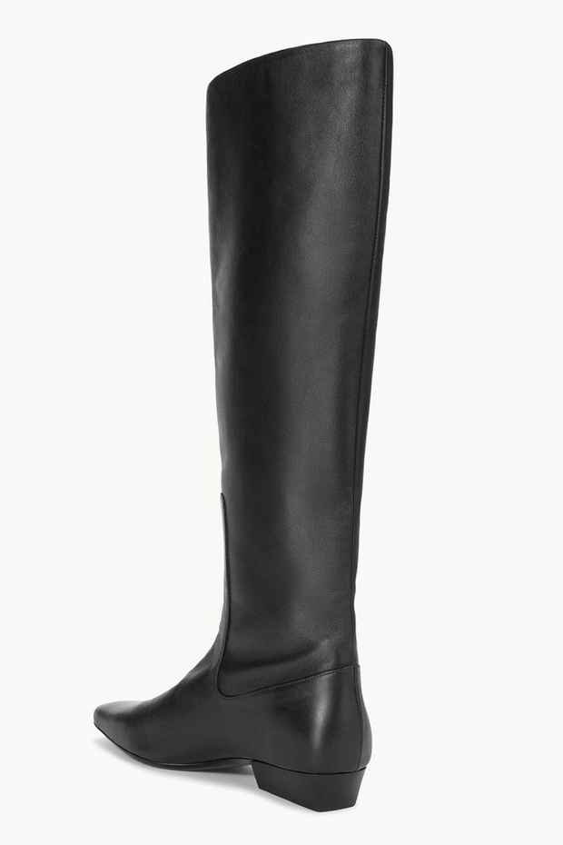 Black knee-high boot on a white background