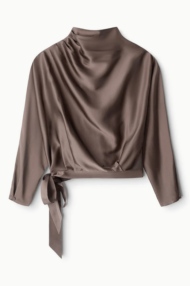 Silk truffle colored blouse on a white background