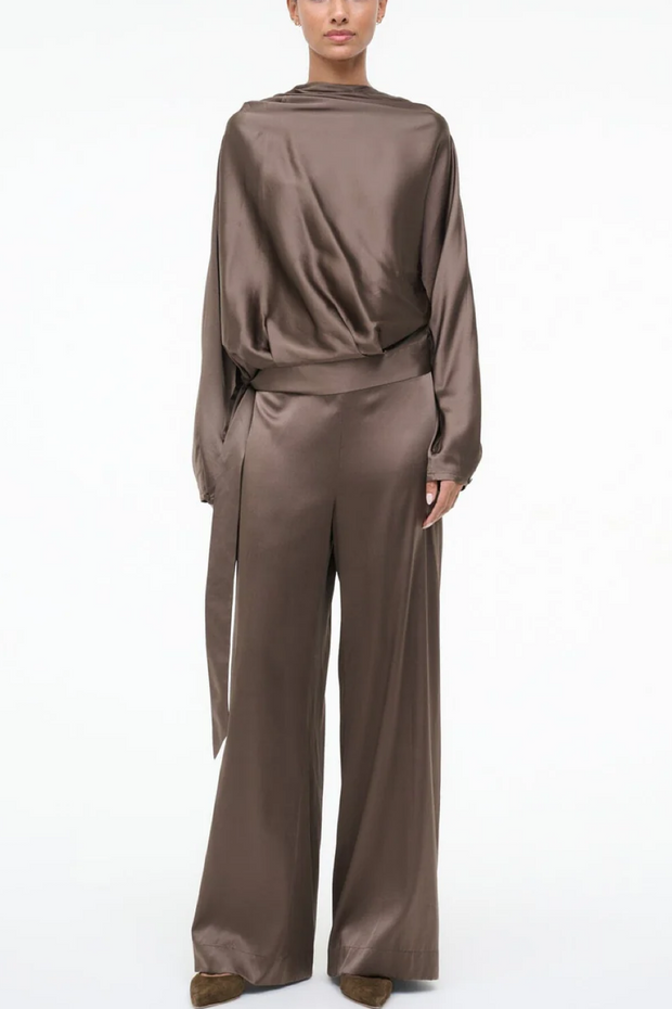 Silk truffle colored outfit with wide-leg pants on a white background