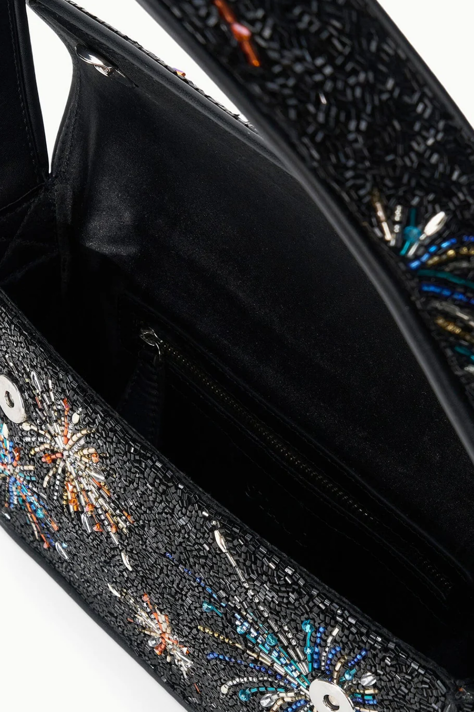 Black clutch bag with colorful bead embellishments on a white background