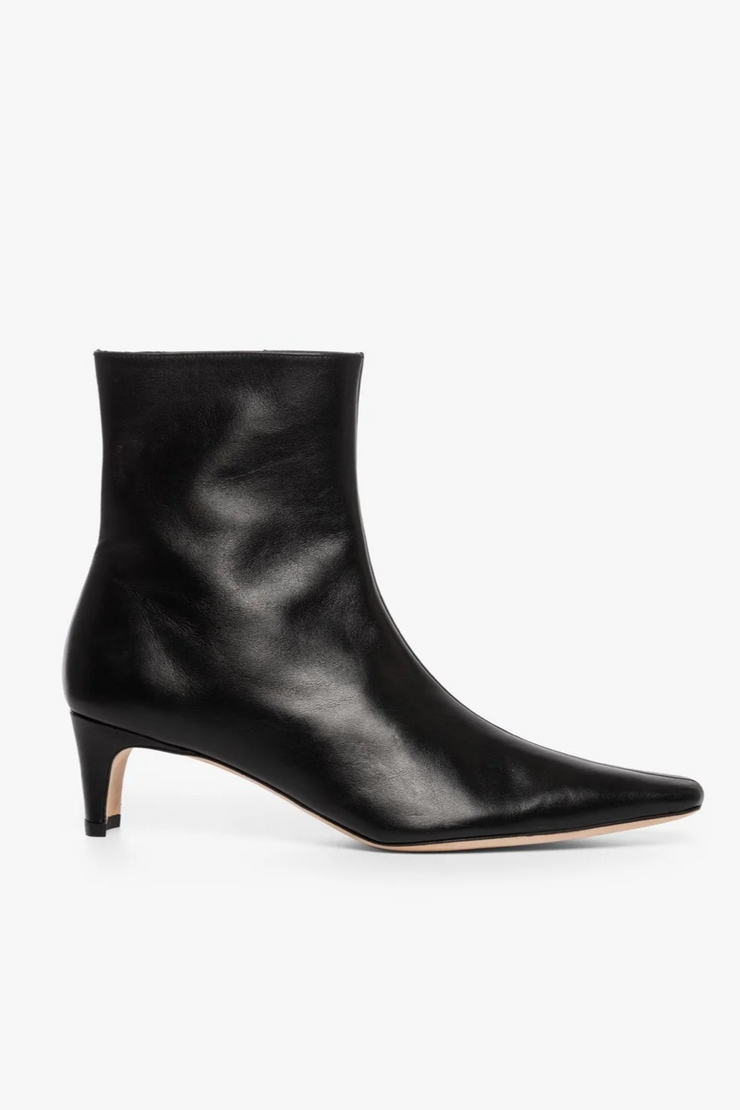 Black ankle boot on a white background