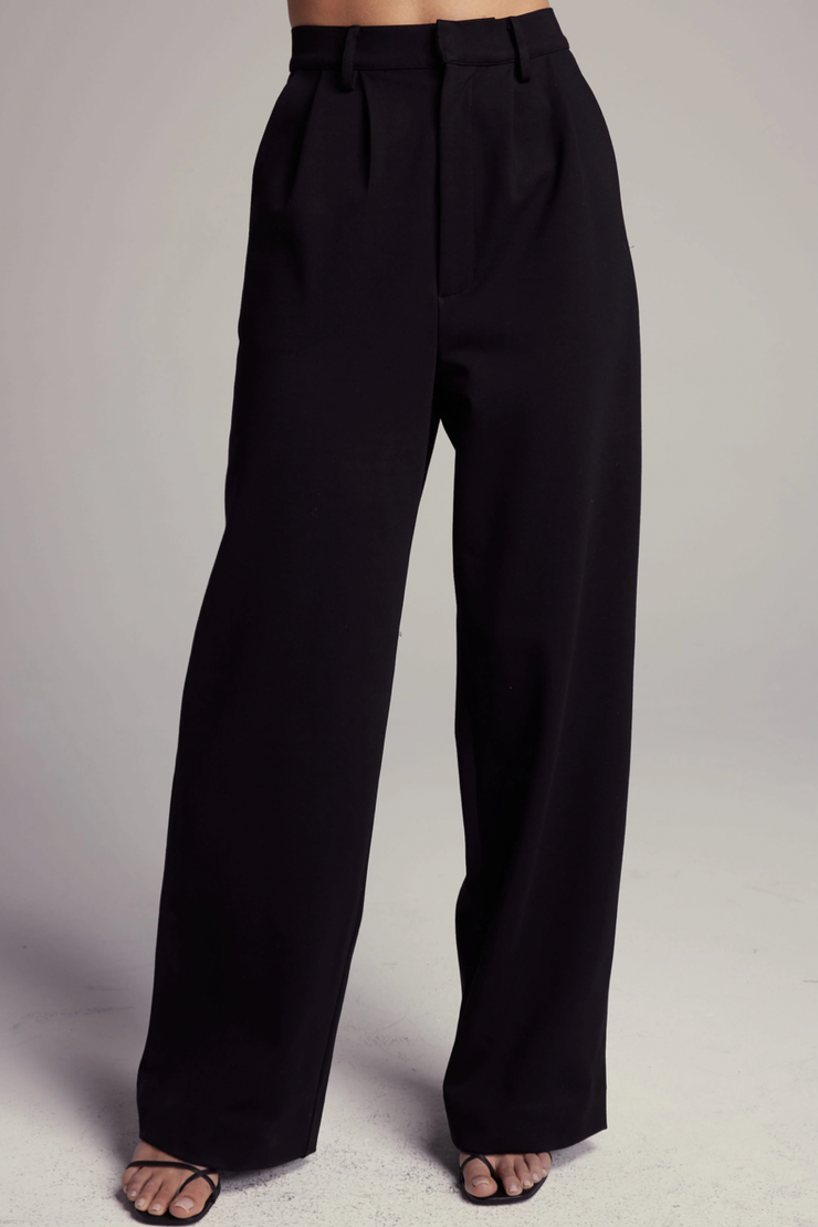 Image of model wearing Sundays Gentry pant in black