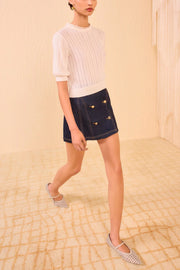 Image of model wearing the Ulla Johnson Gemma Short Sleeve Knit Top front view
