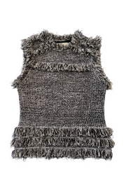 Tweed top against a white background