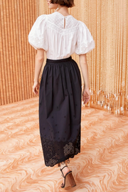 Image of model wearing Ulla Johnson Marisol skirt in noir