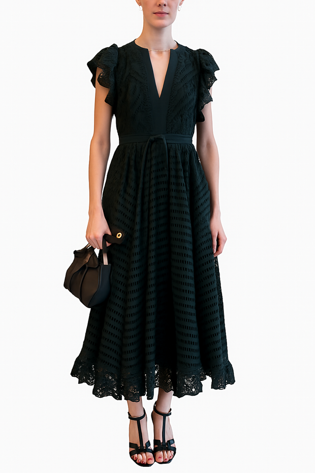 Green lace dress worn by a model on a white background