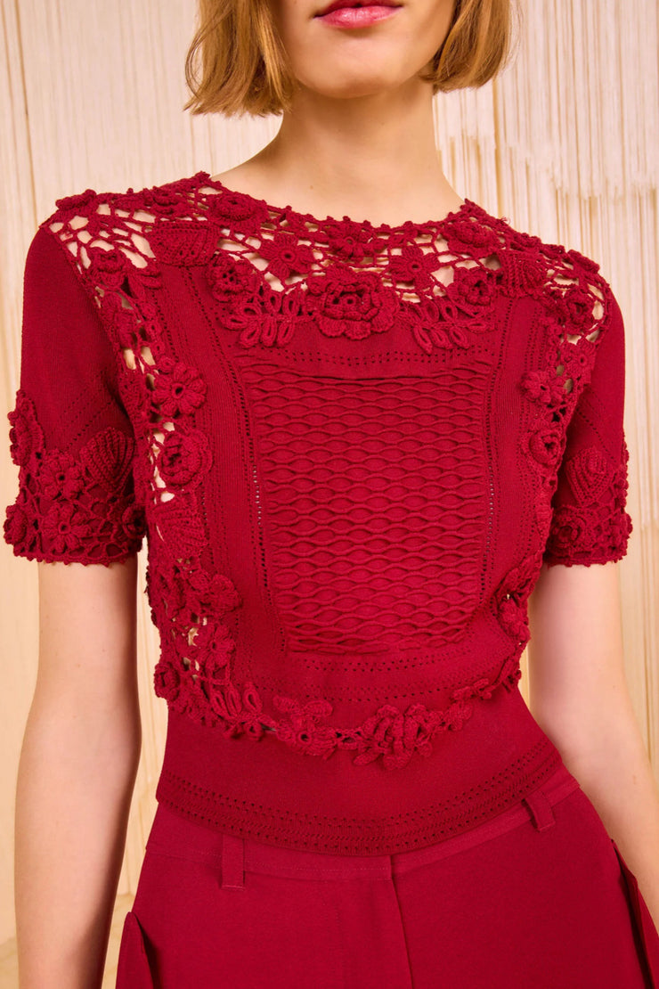 Image of model wearing the Ulla Johnson Stella Short Sleeve Knit Top front view