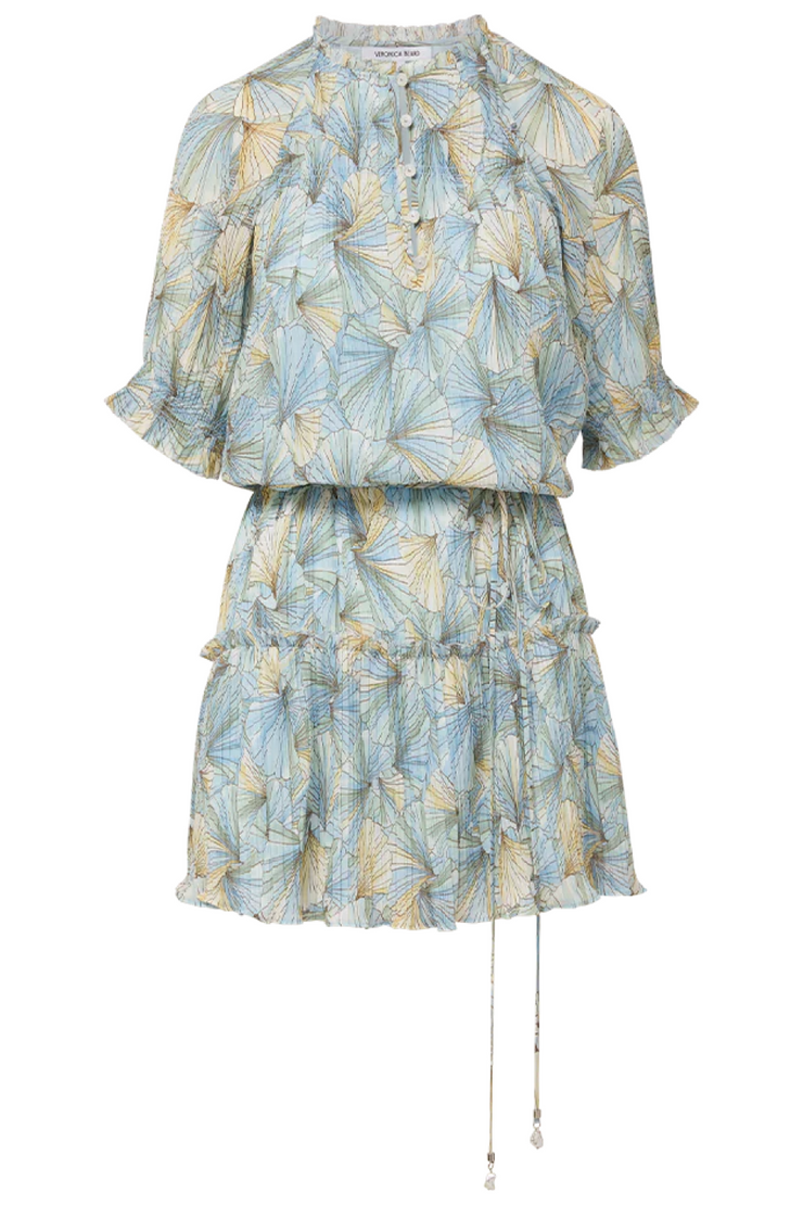Floral patterned dress with ruffled layers on a white background