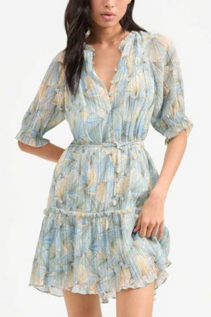 Woman wearing a floral dress with a white background