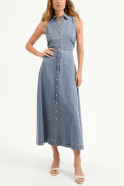 Image of model wearing the Veronica Beard Fuller Midi Dress front view with one hand on hip