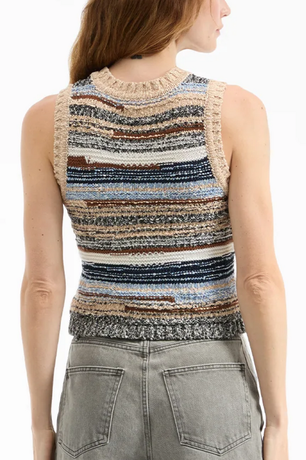 Multicolored sleeveless top worn by a person on a white background