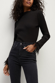 Image of model wearing Veronica Beard Pierre feather tee in black