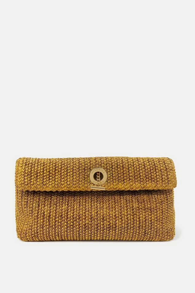 Gold Italian raffia clutch bag with toggle hardware on a white background