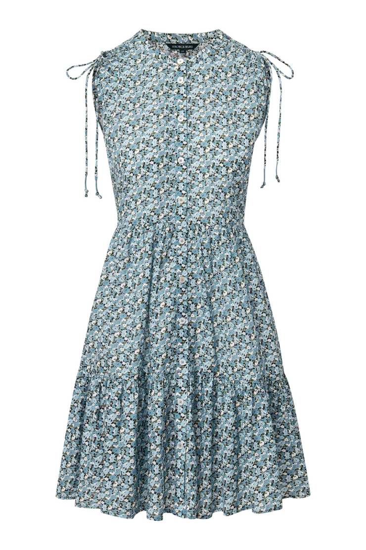 Floral dress with tie straps on a white background