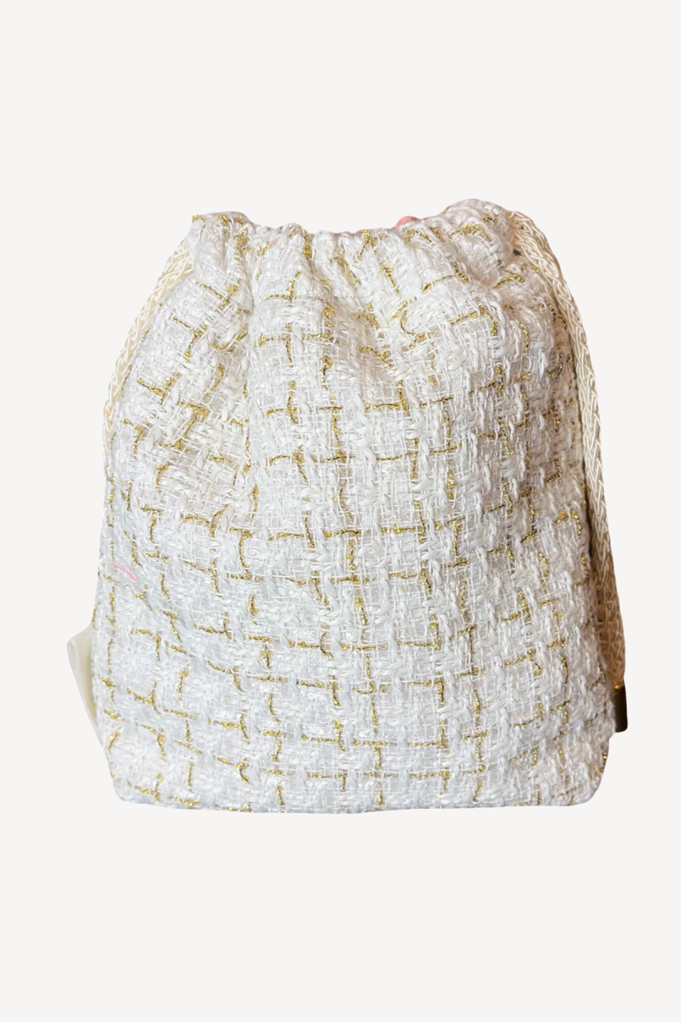 Drawstring bag with a textured pattern on a white background