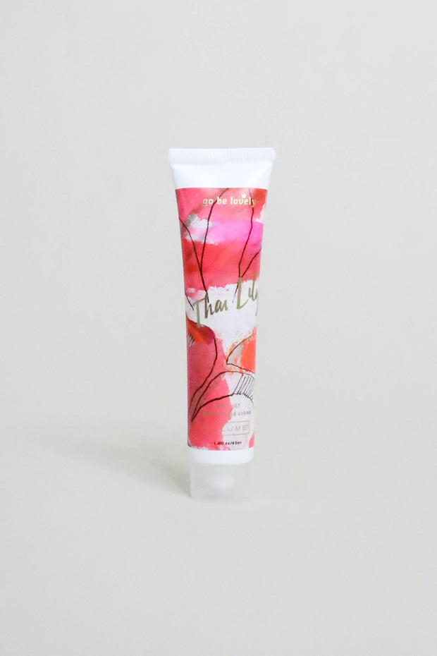 ILLUME Mini Hand Cream Thai Lily front view of tube