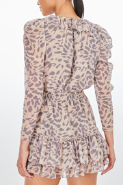Image of model wearing Generation Love Bella dress in soft leopard