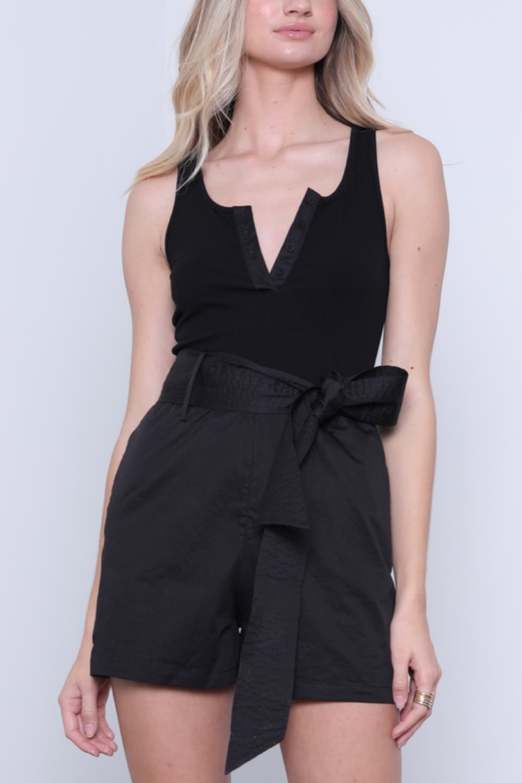 Image of model wearing Karina Grimaldi Juno romper in black