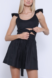 Image of model wearing Karina Grimaldi Sage mini skirt in black