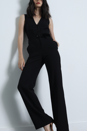 Image of model wearing Karina Grimaldi Vesta jumpsuit in black