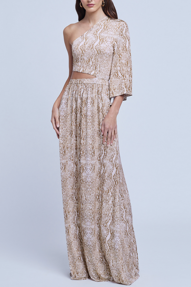Image of model wearing  L'agence Fontana dress in neutral print cobra