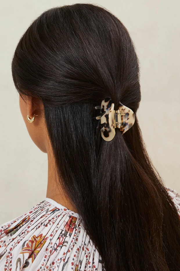 Image of model wearing Loeffler Randall Small claw clip