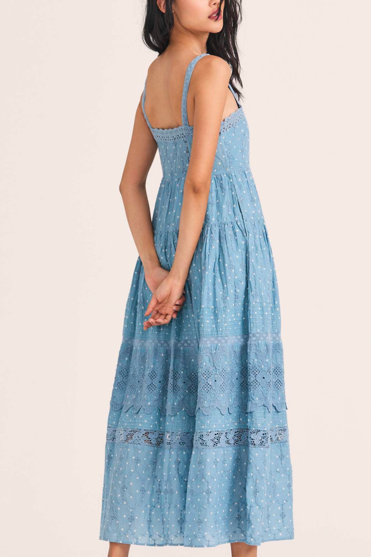 Image of model wearing LOVESHACKFANCY Camisha dress in blue bonnet