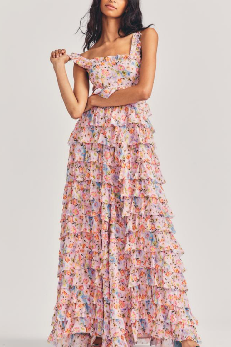 Image of model wearing Loveshackfancy Idra dress in pastel confetti