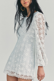 Image of model wearing LoveShackFancy Leira dress in true white