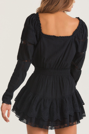 Image of model wearing Loveshackfancy Sanaya dress in black