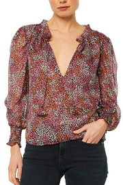 Image of model wearing Misa Siena top in autumn ditsy floral