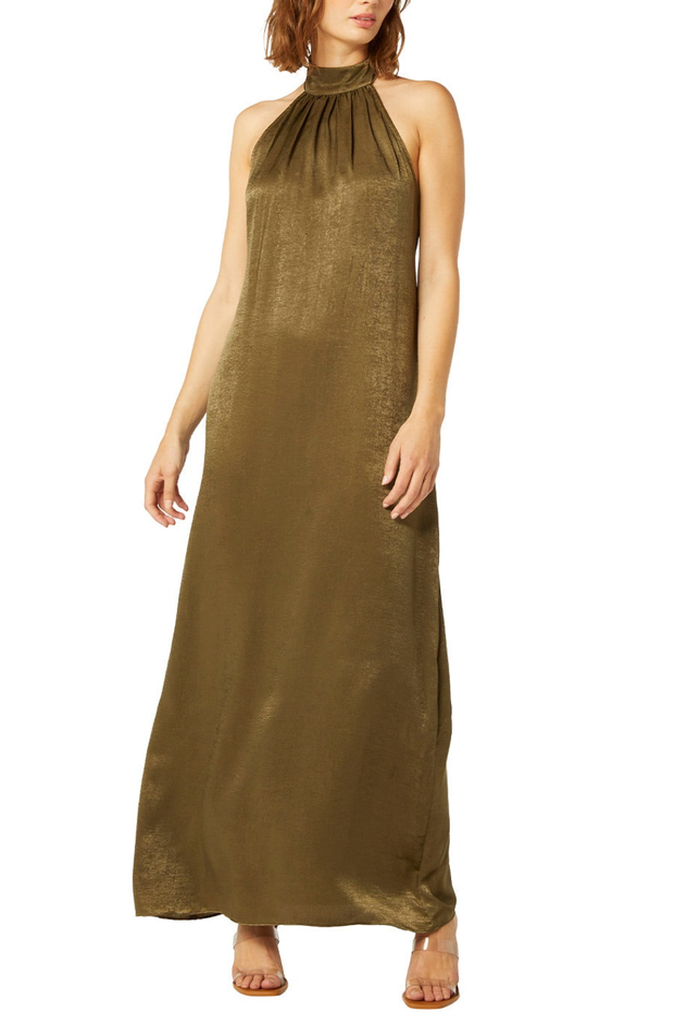 Image of model wearing Misa Zahra dress in olive satin